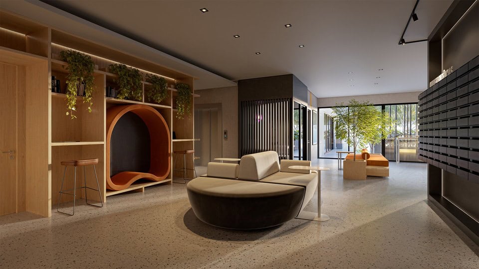 Hall de entrada de edifício residencial com armários de encomendas e área de espera